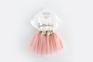 Nieuwe kinderen sets 100% katoen korte mouw bloem t-shirt en rok kinderen set causale zomer meisje kinderkleding