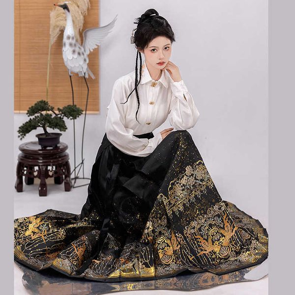 Tejidos nuevos falda con cara de caballo para mujer, Hanfu de la dinastía Ming, tejido dorado, maquillaje, flor china, medio invierno, estilo diario, medio grueso