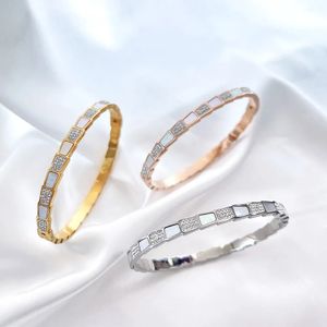Nouvelle version coréenne de l'os titane acier femme galvanoplastie or blanc Bei homme diamant serpent boucle bracelet en gros M2213