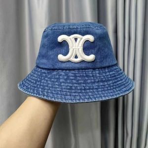 Nouvelle version coréenne de Triumphal Arch Denim Fisherman chapeau à la mode et polyvalente pour faire du shopping Hat à la mode grand chapeau de Sunshade Brim présentant le visage d'un petit gir