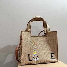 Nouveau grand sac de créateur Raffias Tote de plage Femme Sac à paille tissée d'été Handle Purse Sac Shopping Sacs à main 240410
