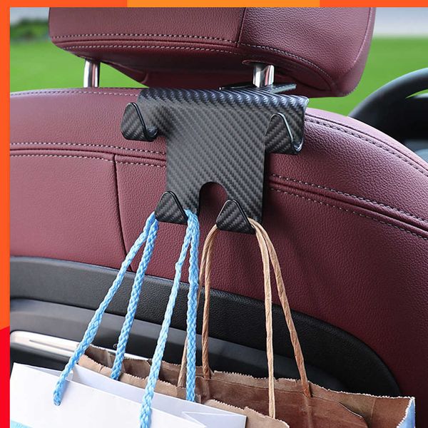 Nouveau dernier siège de voiture appui-tête crochet en fibre de carbone support pour téléphone portable voiture véhicule support universel sac à main sac à main manteau voiture intérieur accessoires