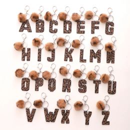 Nieuwe luipaardhars sleutelletter Alphabet Tassel Key Chains ringen vrouwen pompom hanger Keyringhouder Charms Bag