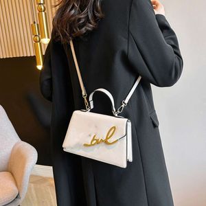 Nieuwe licht luxe modebrief trendy ketting schouder schouder minimalistisch Instagram dames kleine vierkante tas