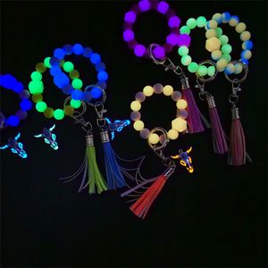 Nouveau porte-clés de perles de silicone lumineuses bracelet de bracelet de fête en silicone lueur dans le noir perlé pour les femmes cadeaux en gros