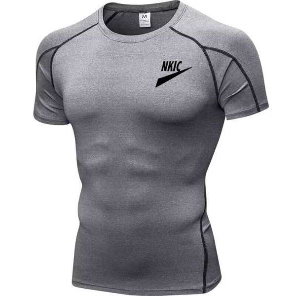 Hommes compression Running Brand Logo Black T-shirt Fitness Fitness Terre à manches courtes Sport Sport Tshirt Jogging Shirts Gym Sportswear