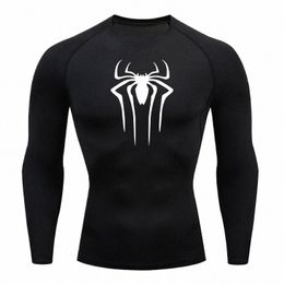 Nouveaux hommes Compri T-shirt Rgard Fitn Lg Manches Chemise de course Hommes Gym T-shirt Football Jersey Sportswear Sport Tight U4ek #