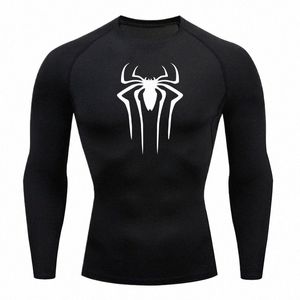 Nouveaux hommes Compri T-shirt Rgard Fitn Lg Manches Chemise de course Hommes Gym T-shirt Football Jersey Sportswear Sport Tight U4ek #