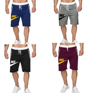 Nuevos hombres gimnasio Fitness pantalones cortos sueltos culturismo Joggers verano secado rápido Cool pantalones cortos hombre Casual playa marca pantalones de chándal