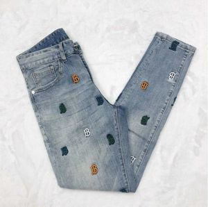 Nieuwe heren jeans witte stoffen designer broek geborduurde broek mannen en vrouwen losse casual jeans