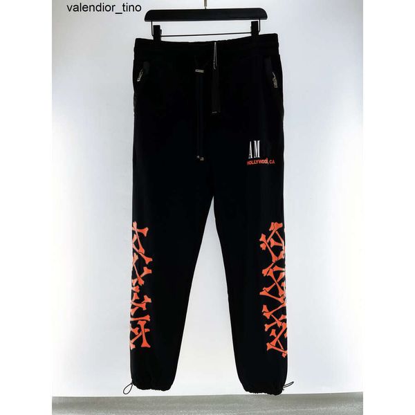 Nouveaux pantalons de créateurs de luxe pour hommes style décontracté hommes broderie lettre d'os camouflage joggers pantalon vente chaude pantalon cargo taille élastique hommes vêtements pantalons