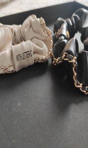 Nieuwe metalen ketting mode -symbool klassiek elastisch haarbanden lederen haardbandfeest cadeaubonnen 9538859