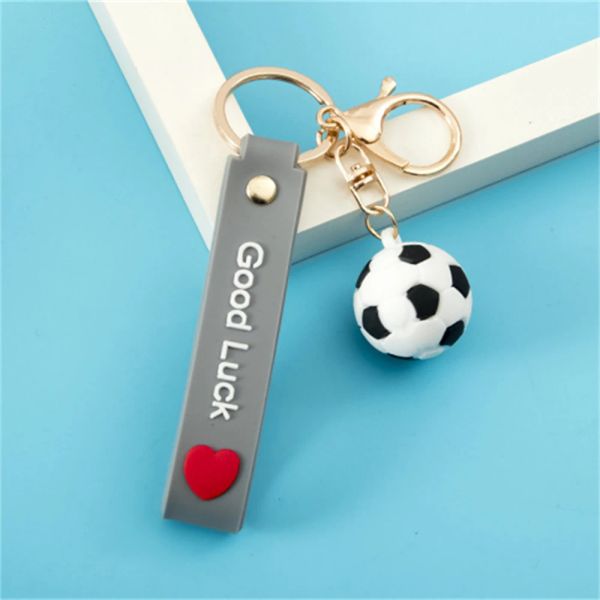 Nouveau mini-balle porte-clés PVC Soft Glue Football Basketball Rugby Tennis Sporting Keyring pour sac Car Key Pendentif Fan Lucky Gift