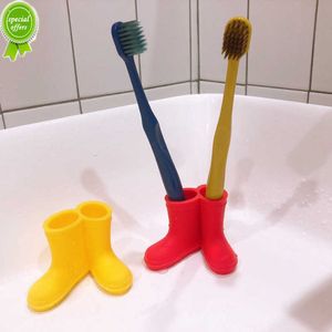 Nuevo Mini Botas de lluvia Soporte para cepillo de dientes 45mm Mini Soporte para cepillo de dientes Estante Elástico Baño Cepillo de dientes Herramienta de almacenamiento Soporte para cepillo de dientes