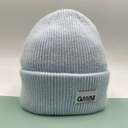 Nuovo cappello senza tesa dal design minimalista cappello lavorato a maglia in pelo di coniglio cappello invernale in lana con protezione per le orecchie155581