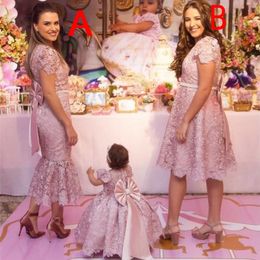 Nuevos vestidos de niña de madre e hija encaje encantador para bodas mangas cortas para niñas vestidos de concurso para niños.