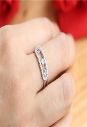 Nouveau mouvement pierre doigt couple anneaux cz anneaux mobiles pour les femmes bague de mariage 925 en argent sterling france marque bijoux 8254662