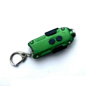 Nouveau Camping en plein air et cyclisme Portable alpinisme Mini porte-clés solide petite lampe de travail cadeau créatif 400139