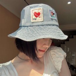 Nieuwe patchwork watermerk denim visser voor vrouwelijke lente- en zomer-nichestudenten Veelzijdige zonbeschermingsbassin-hoed