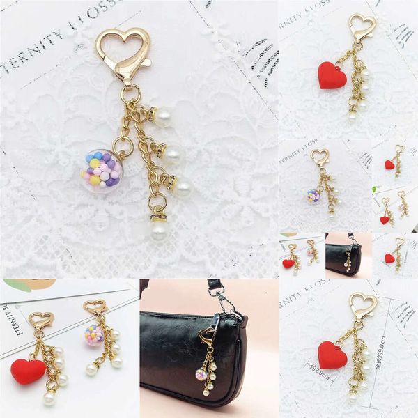 New Pearl Pichel Keychain Fashion Love Heart Pendant pour les femmes Ornements de sac Ornements de voiture Accessoires Créatifs DIY Creative Keyring