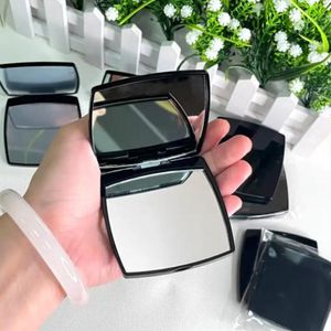 Nouveau rose blanc noir rouge jaune violet gris miroirs compacts mode acrylique cosmétique miroir portable pliant sac à poussière en velours miroir étiquette concave avec boîte-cadeau 357