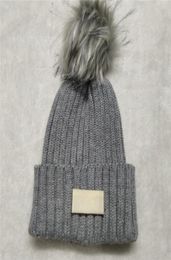 Nouveau Pom hiver nouveau chaud laine chapeau concepteur tricoté femmes chapeaux vente bonnets à la mode 6299758