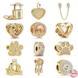 El nuevo y popular colgante de plata de ley 925 y la brillante perla de oro en forma de corazón son adecuados para la pulsera de joyería de mujer DIY primitiva IRLC