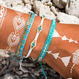 Nouvel ensemble de bracelet tissé à la main de style bohème populaire avec bracelets de perles de riz