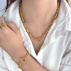 Nouvelle chaîne de clavicule populaire, collier de bracelet en acier inoxydable personnalisé et créatif, nœud simple pour femmes, ensemble de chaîne de cou à boucle OT
