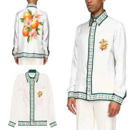 Nuevo producto Casablanca 24ss Camisa casual de seda de diseñador Hombres y mujeres Unisex Estampado de flores de naranja Playa de Hawaii Suelta Delgada Casual Versátil Camisa simple Top Casablanc