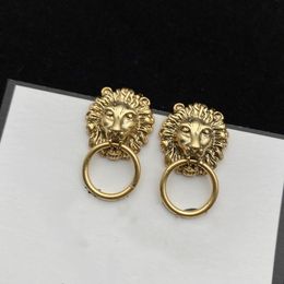 Nouveau produit de haute qualité Bronze plaqué or boucles d'oreilles rétro mode Design Lion boucles d'oreilles ronde bijoux approvisionnement linkA