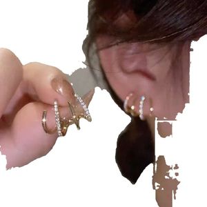 Boucles d'oreilles à quatre griffes, nouveau produit, Design de Niche sur Internet, célèbre femme Anti-allergie, aiguilles en argent, à la mode