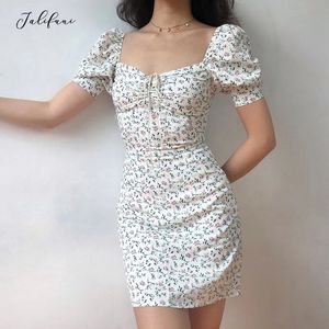 Nouvelle robe à manches bouffantes sans dos sexy femmes été moulante mini robe blanche impression florale tunique plage fête robe d'été femme 210415