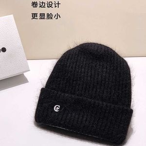 Nouveau chapeau tricoté de cheveux de lapin pour chaleur et protection de l'oreille pour femmes