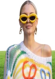 Nouvelle forme de lèvre rouge Y2K Lunettes de soleil pour femmes Nouvelles bonbons de mode couleur jaune verres de soleil rose hommes sexy