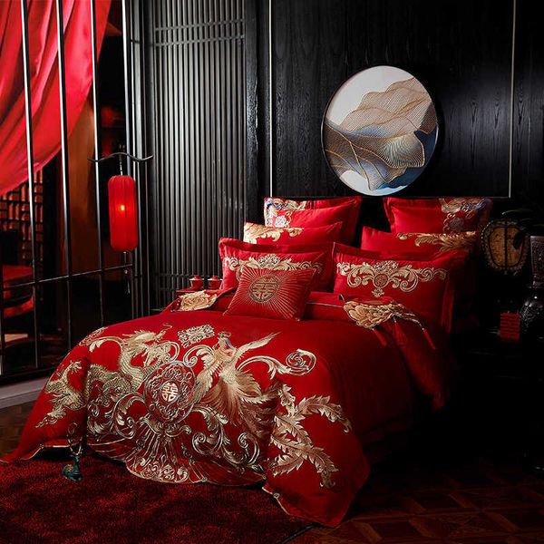 Nuevo rojo de lujo dorado Fénix Loong bordado boda china 100% juego de cama de algodón funda nórdica sábana colcha fundas de almohada H0913