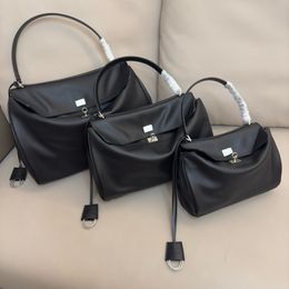 Nieuwe rodeo zwarte gesp greep crossbody tas ontwerper tas koehide tas tas omgedraaid handtas luxe schoudertas mode casual banket tas roterende knop