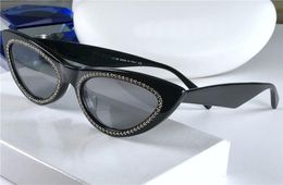 Nouvelles lunettes de soleil de créateur de mode Sell 4S019 Cat Eye Cadre Caractéristiques de la carte Populaire Style Simple Top Quality UV400 Protection9868899