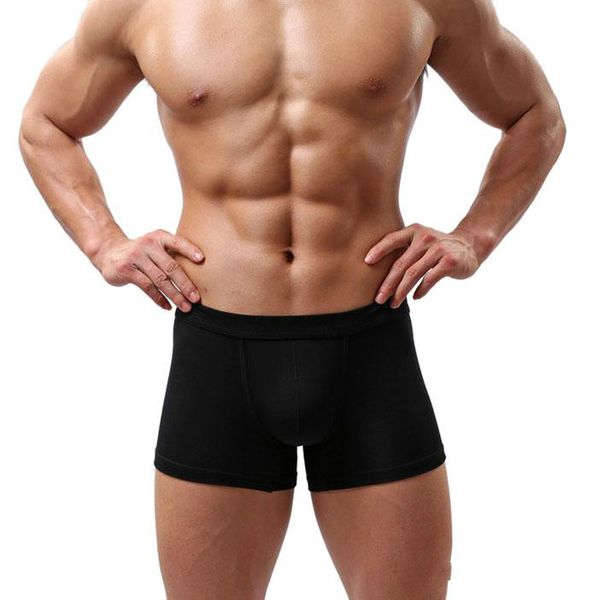 Nouveau Sexy hommes sous-vêtements noir blanc 2017 mode hommes Boxer Shorts poche bombée doux caleçons 5 pcs/lot