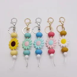 Nuevos accesorios de pulsera con cuentas de silicona para comercio exterior, llaveros, bolsos, colgantes, pequeños accesorios creativos de girasol DIY