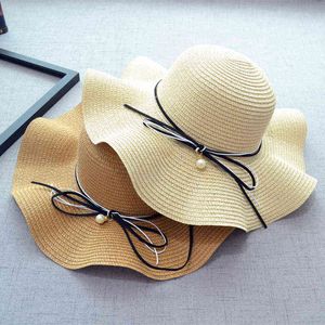 Nouveau printemps et été Bowknot perle extérieur parasol chapeau de paille mode vague côté femmes grande casquette de plage pliable G220301