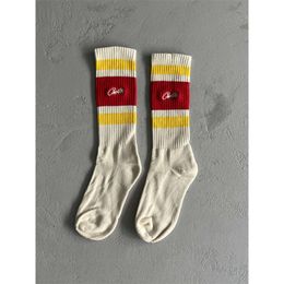 Nuevas medias Devils Island calcetines largos a rayas calcetines de pareja bordados Instagram Street Ukdrill