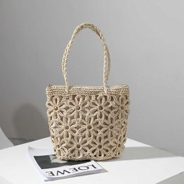 Nouveau sac tissé en paille évidé fleur herbe femmes une épaule Portable plage vacances sac en rotin 240312