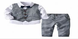 NIEUW Studentenpak Kinderjongen Pak Witte shirt Vestbroek 3 % Gentleman Formele peuter babyjongenkleding 1S6I2493070
