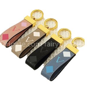 Nieuwe stijl Designer Keychains Auto Key Chain Bags Decoratie Cowhide Geschenkontwerp voor man Woman 4 Optie Topkwaliteit Gift Accessories