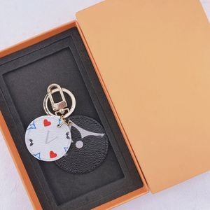 Nouveaux designers de style Keychain Keychain Key Buckle Lovers Car Keches de cuir fait à la main Men de sacs Femmes Pendants Pendants High Quality