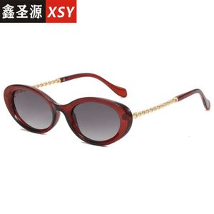 Nieuwe stijl kleine ovale zonnebril mode eenvoudige ronde bril gepersonaliseerde ketting netto rode zonnebril vrouwelijk