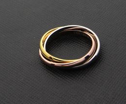 Nieuwe stijlvol roestvrijstalen tricolor drie in één naadloze ringen gemengd gele golden goldsilver metaalkleuren titanium minnaar1673803