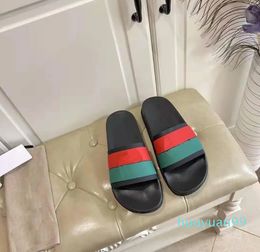 Nuevos hombres y mujeres de verano039s parejas zapatillas dúo verde estación europea flipflop de goma suave marca de marea playa inferior n