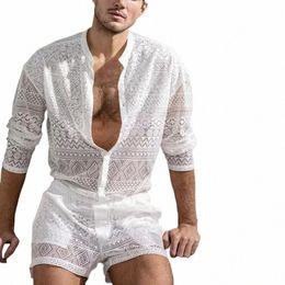 Nuevos trajes de dos piezas de verano para hombres Conjuntos transparentes Trajes de encaje Playa Patrón liso Imprimir LG Tops con mangas y pantalones cortos Conjunto Masculino Z3hn #